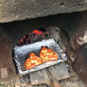 First pizza's out of the oven. Yum Yum!