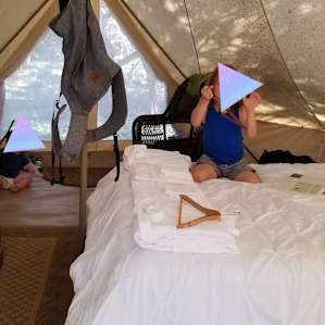 Kids checking out their glamping digs