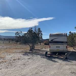 Our humongous camper fits well into the campsite!