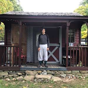 My son, 5’ 1” showing the size of the cabin.