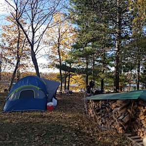 Tent camping in woods or meadow