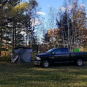 Tent camping in woods or meadow
