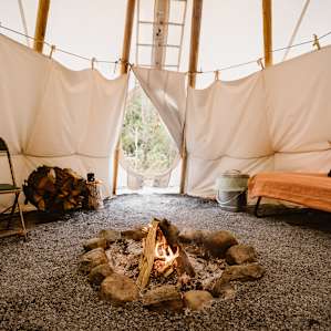 We stayed warm by keeping our campfire lit.