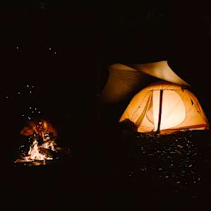 Cozy fire pit by the tent.