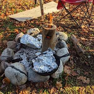 Hollowed out log stove, breakfast at its best.