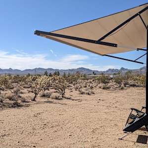Flat desert with mountain views.