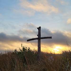 Cross at the summit of the hill on the property.
