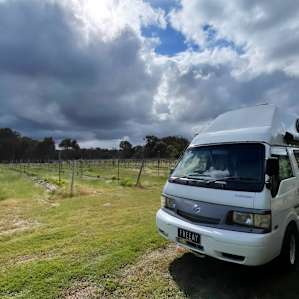 Our RV in a spot of sunshine