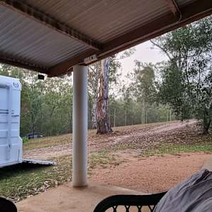 Enjoying a glass of wine at the end of the day watching the storms come across