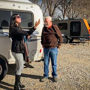 My friend Elsa speaking with the camp host Luis Torres.