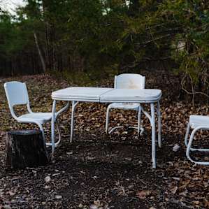 Our camp site had tables and chairs near the fire to have dinner at!