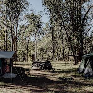 Camping area with toilet at the back