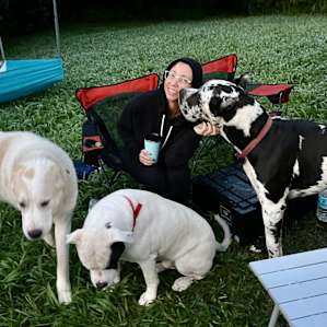 Kristine with the owners 3 dogs!