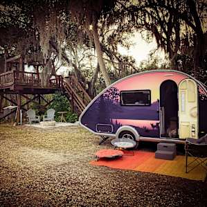 Camping spot with a cute treehouse.