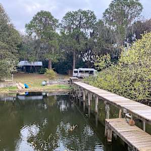View of our campsite and the hosts home from the end of the dock looking back. The other campsite is to the left of the picture on a hill.