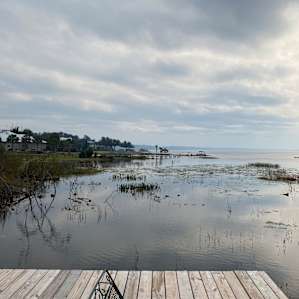 At the end of the dock, looking towards the left. The lake view is 180 degrees - I should have tKen a video.