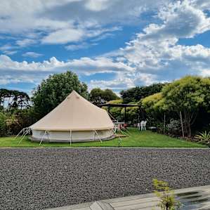 View of the tent from the bathroom and toilet