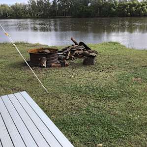 Campfire at site next to beach