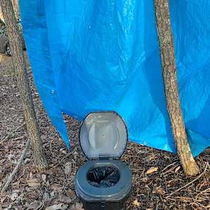 Camping toilet with a nice privacy curtain Sydney put up for me at my request.