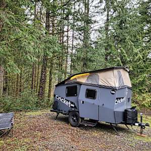 The overflow site can fit a small camper but site 2 can take a big one.