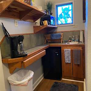 Cabin in fenced garden/orchard