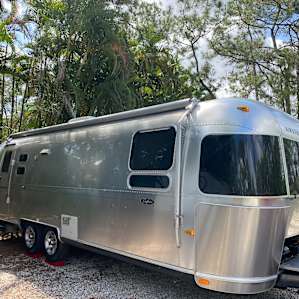 Our 28 ft airstream fit but was a bit tight.