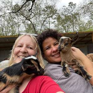 Cuddling baby goats!