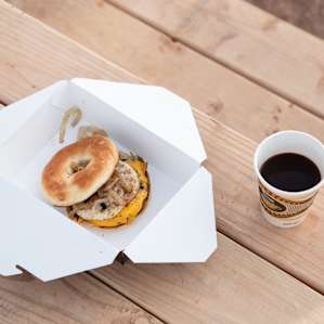 The breakfast sandwich and complimentary coffee.