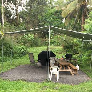 Covered picnic area has an awesome grill and propane firepit! So cozy! Great place to hang out in the evenings. and not mosquitoes!
