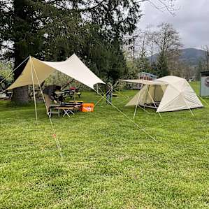Cozy tent site near the bathroom and hot shower.