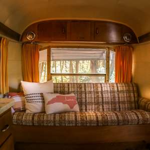 The living room and couch area in the camper.