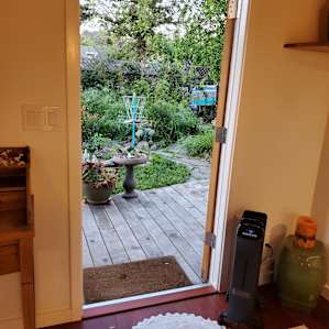 Cottage's front door to porch