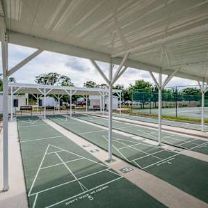 Shaded shuffleboard courts