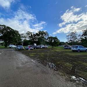 Cars and vans parked on grass despite us not being allowed to