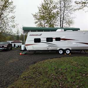 29' trailer backed in next to owners trailer