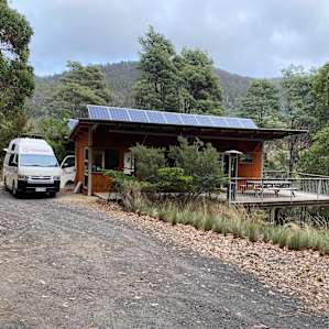 Camp lounge and kitchen. Fully stocked.
Toilets and showers behind.
