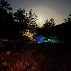 Full moon, cozy camp spot.