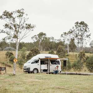 All set up with an open firepit ready to go, doesn't get any better than this! Lovely dam to swim in behind the van. Parked at location 1.