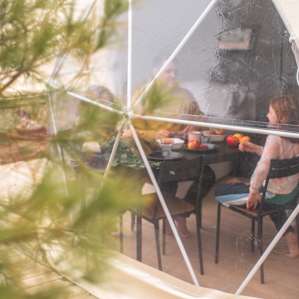 Large dome window overlooking the pond