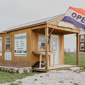 The listing is easy to find with this shop at the end of the driveway.