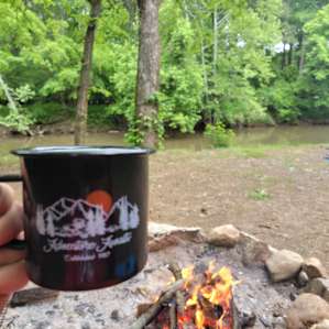 Enjoying coffee by the river