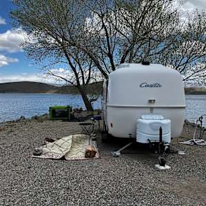 Site #9 on the peninsula. Great views all around. The fire pit was small not very secure and under a tree. We didn't feel comfortable using it.