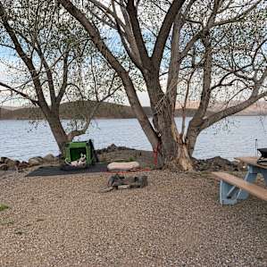 Site #9 on the peninsula. Great views all around. The fire pit was small not very secure and under a tree. We didn't feel comfortable using it.
