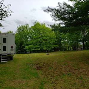 Our campers spot! With the cool fresh air at night, we sat by the campfire, and at bed time opened the windows and listened to the soft sounds of nature with the windmill in the distance.
