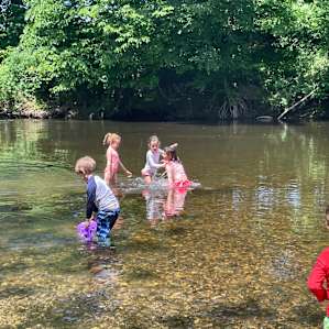 The pebble beach at the end of the river float.