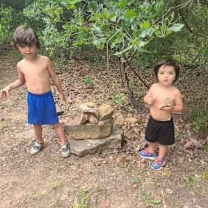 Trying to stack rocks like they saw near the entrance! They left a little mark!