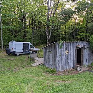 My camper van with the mining cabin in the foreground.
