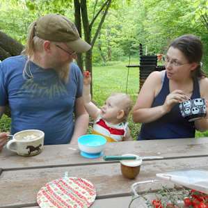 Having fun with Mom and Dad at the picnic table!