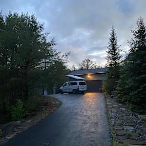 Tenters have a spot down by the lake. As a van camper, I got a nice, flat site looking out into the pine forest.