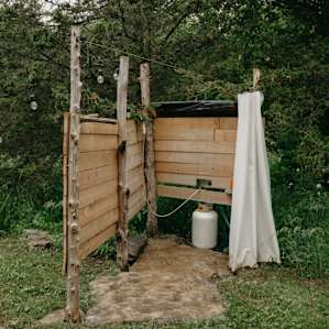 Hot showers are so LUX, this cute addition to the space means you can feel fresh while living in the woods.
